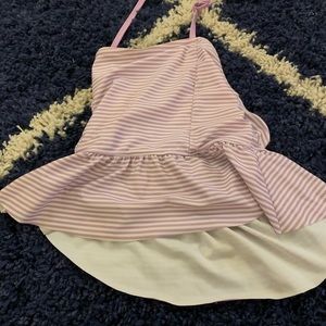 A purple halter neck bathing suit top